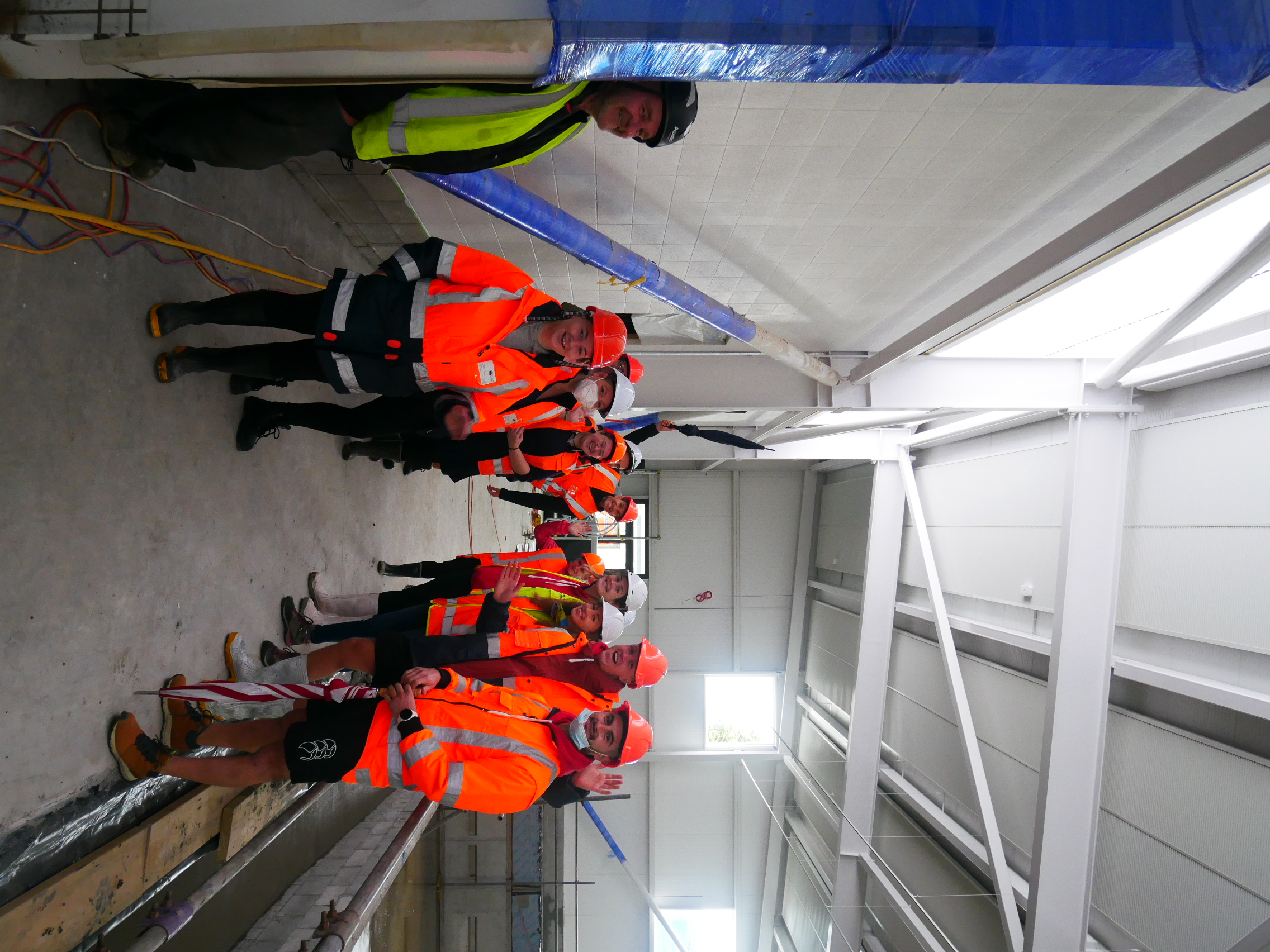 Pool staff on tour of facility in June 2022
