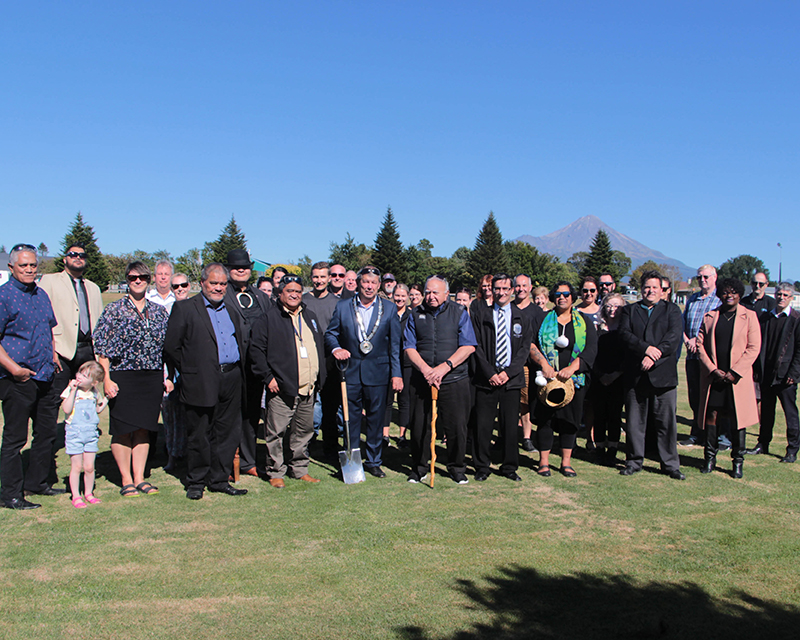 Aquatic Centre blessing - photo of people standing on site of pool project