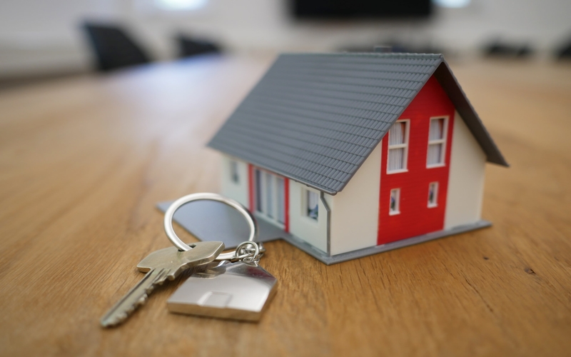 Image of mini house with keys