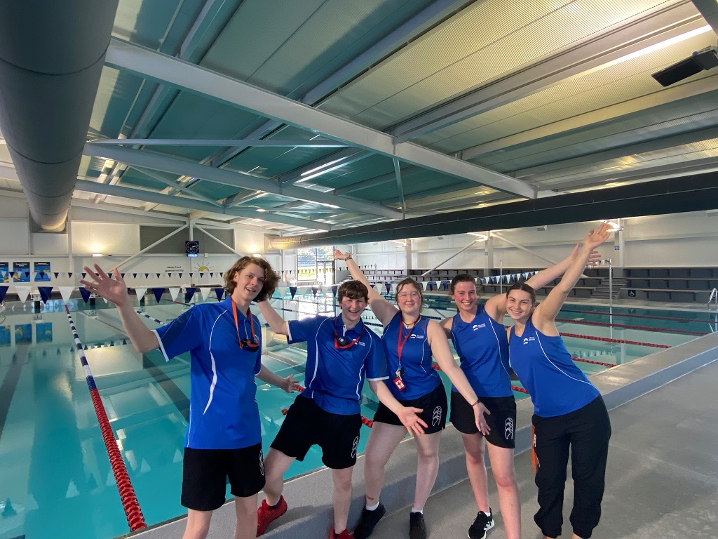 Photo of Wai o Rua  - Stratford Aquatic Centre staff showing off the new pool
